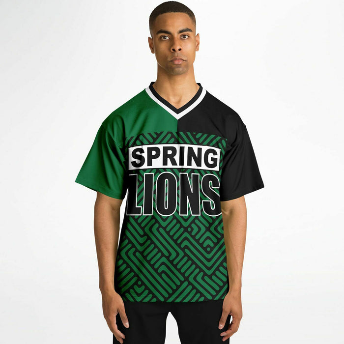 Black man wearing Spring Lions High School football Jersey