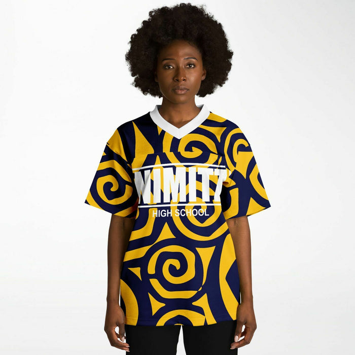 Black woman wearing Nimitz Cougars High School football Jersey