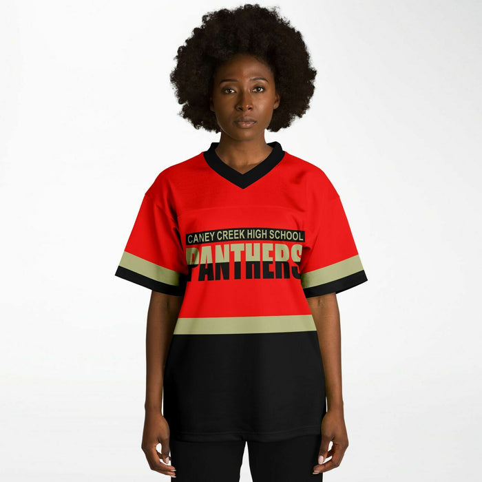 Black woman wearing Caney Creek Panthers football Jersey 10