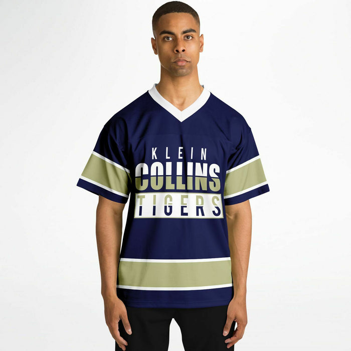 Black man wearing Klein Collins Tigers football Jersey 13