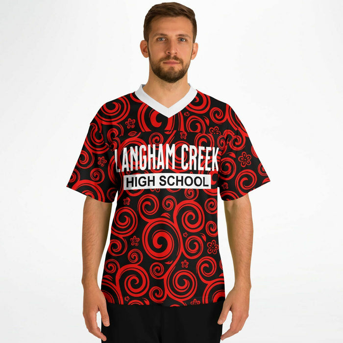 Man wearing Langham Creek Lobos football jersey