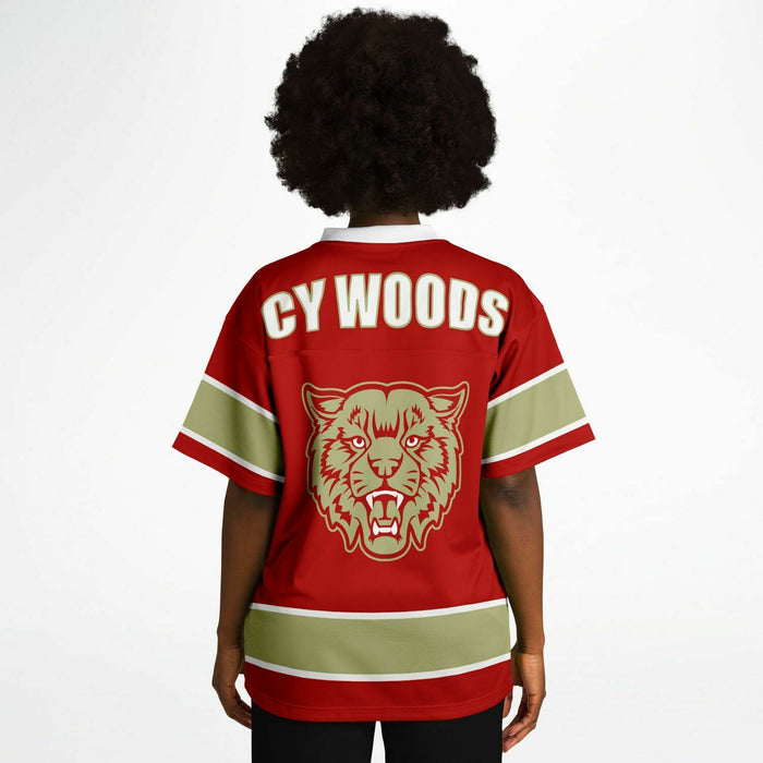 Women wearing Cypress Woods Wildcats football jersey 13