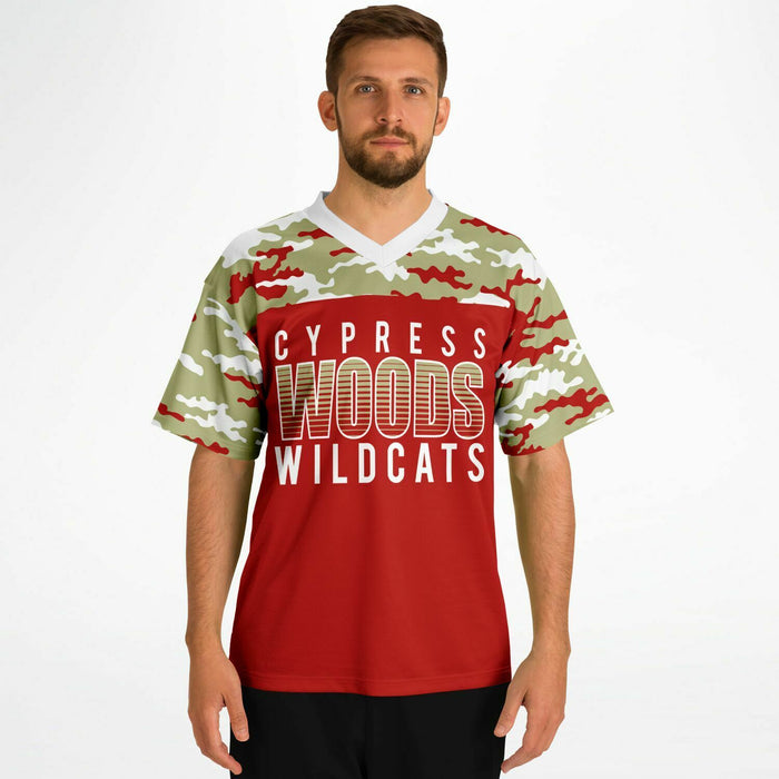 Man wearing Cypress Woods Wildcats football jersey 08