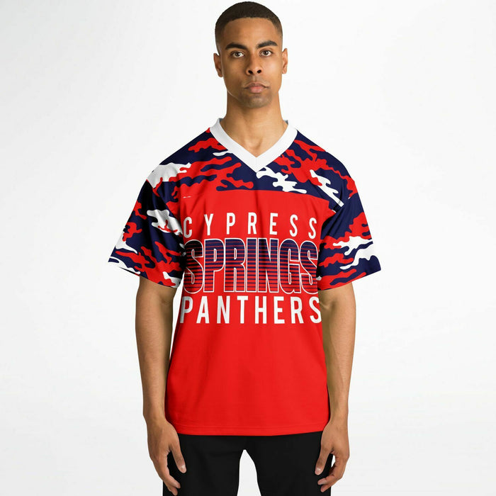 Black man wearing Cypress Springs Panthers football Jersey