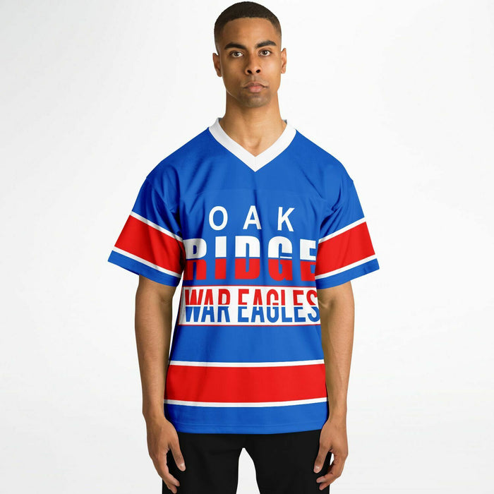 Black man wearing Oak Ridge War Eagles High School football Jersey