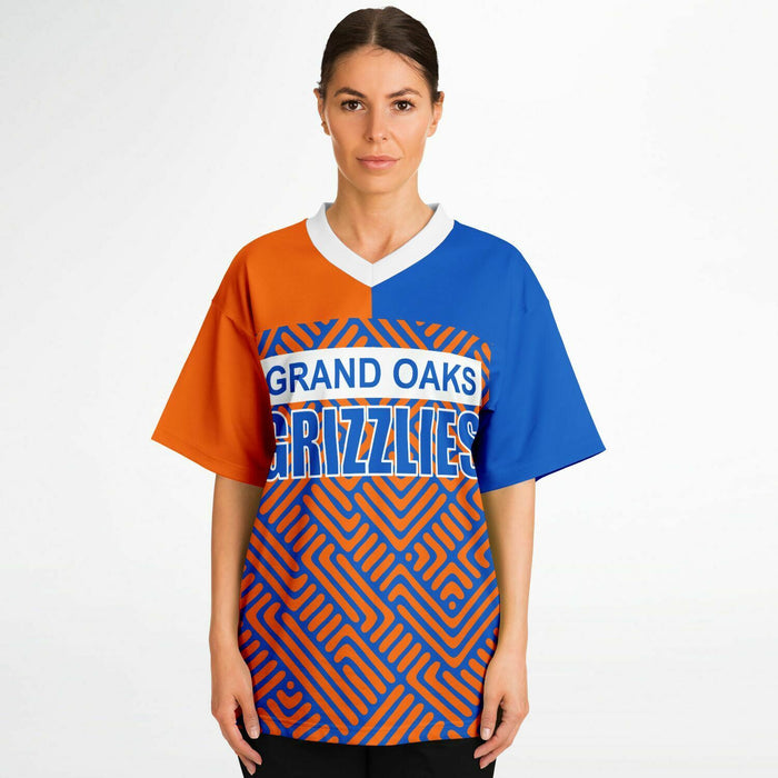 Women wearing Grand Oaks Grizzlies football jersey