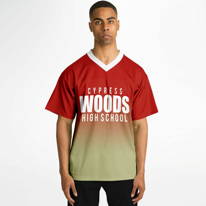 Black man wearing Cypress Woods Wildcats football Jersey 05 