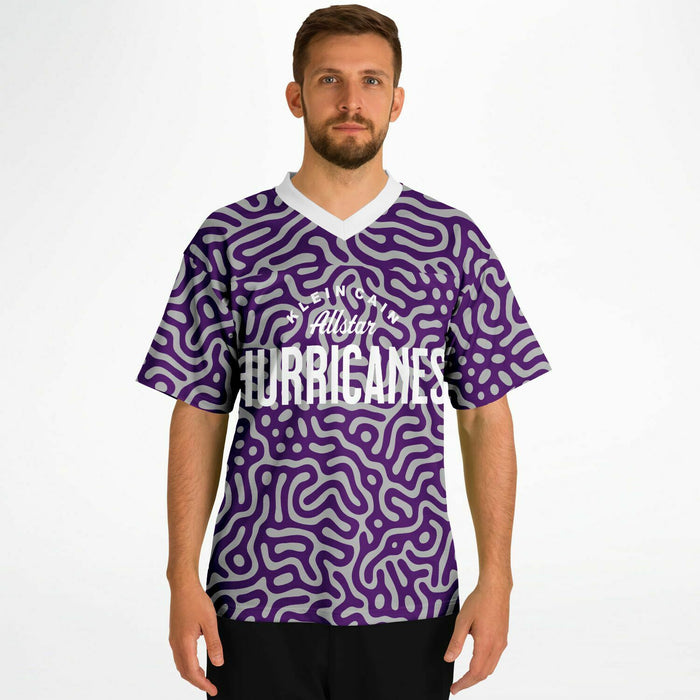 Man wearing Klein Cain Hurricanes football jersey