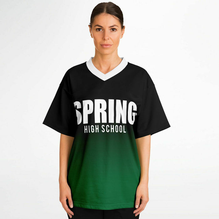 Women wearing Spring Lions High School football jersey