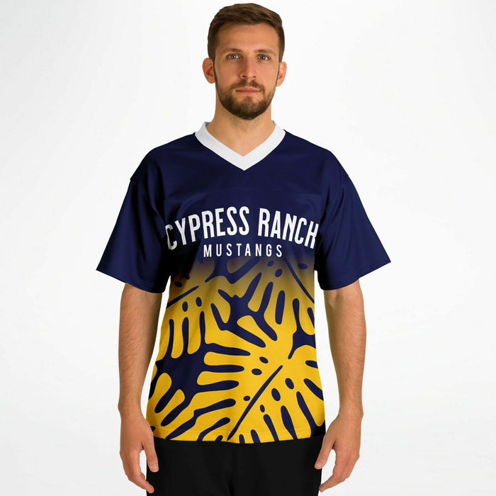 Man wearing Cypress Ranch Mustangs football jersey
