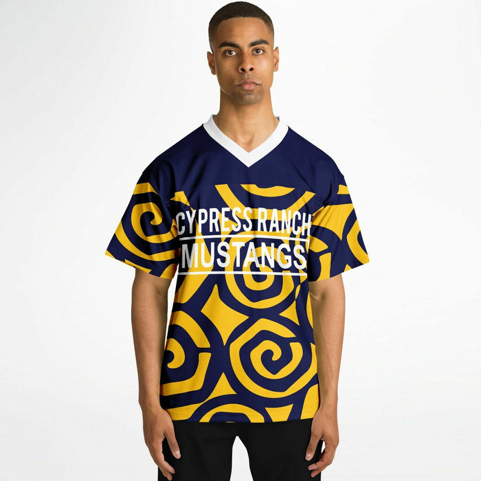 Black man wearing Cypress Ranch Mustangs football Jersey