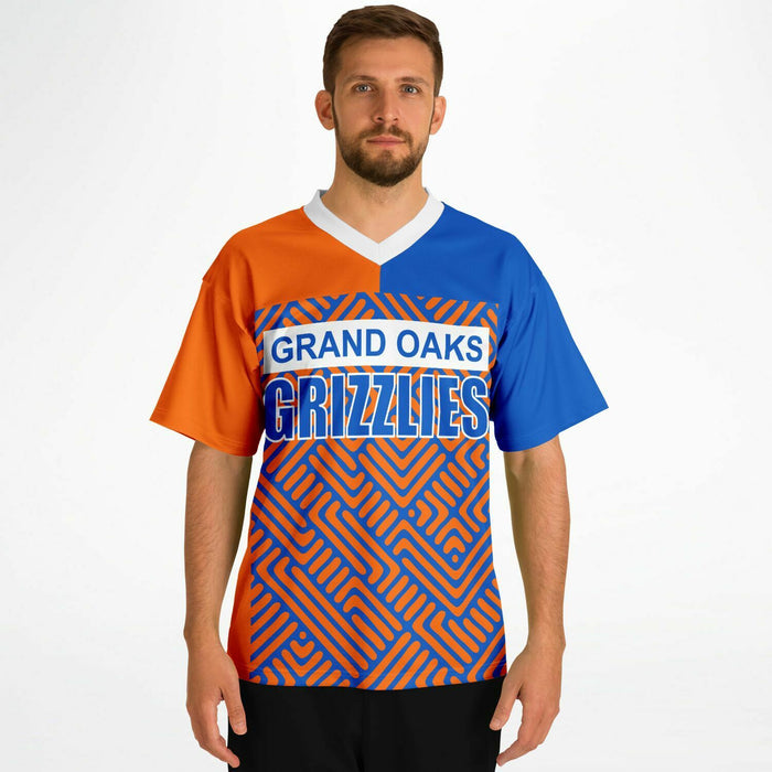 Man wearing Grand Oaks Grizzlies football jersey