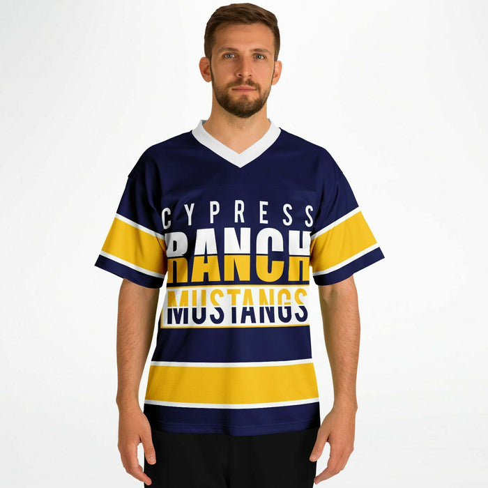 Man wearing Cypress Ranch Mustangs football jersey