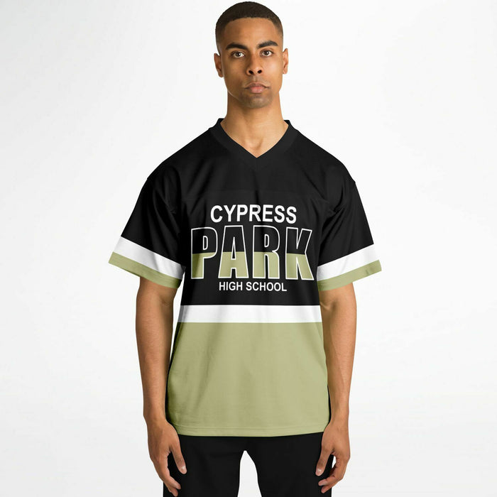 Black man wearing Cypress Park Tigers football Jersey 10