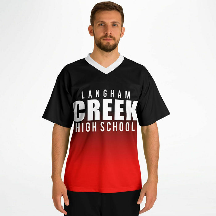 Man wearing Langham Creek Lobos football jersey