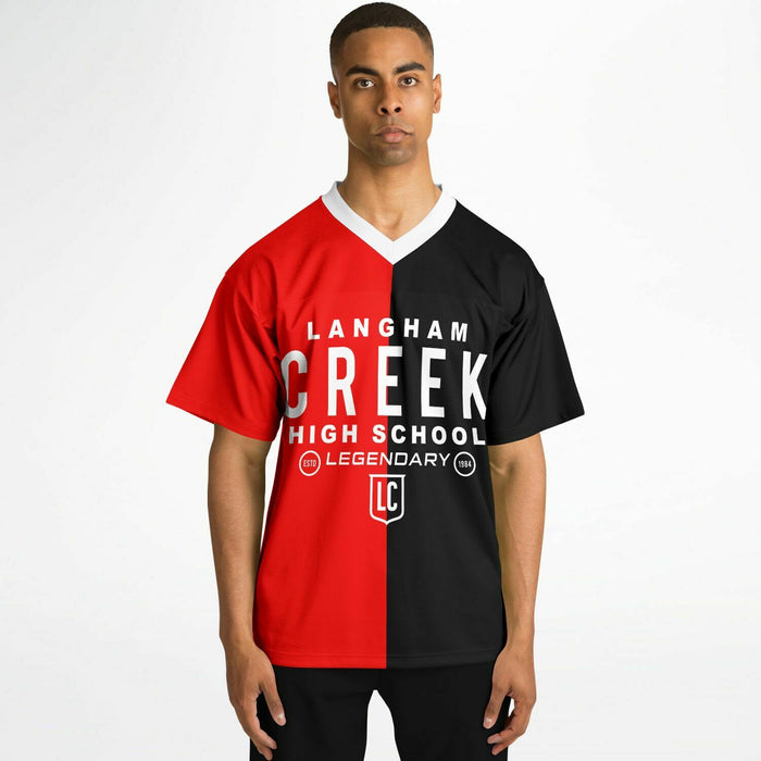 Black man wearing Langham Creek Lobos football Jersey