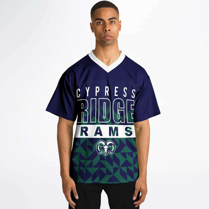 Black man wearing Cypress Ridge Rams football Jersey