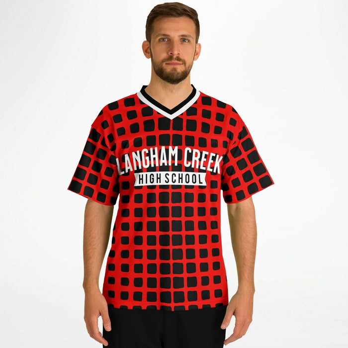 Man wearing Langham Creek Lobos football jersey