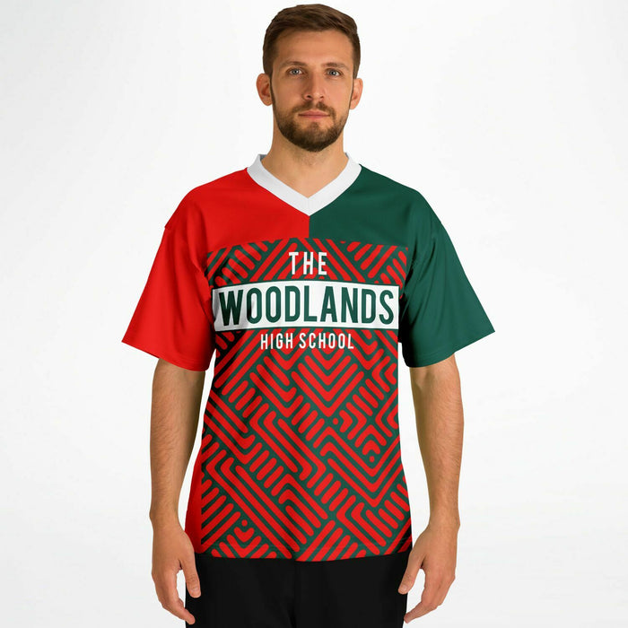 Man wearing The Woodlands Highlanders High School football jersey