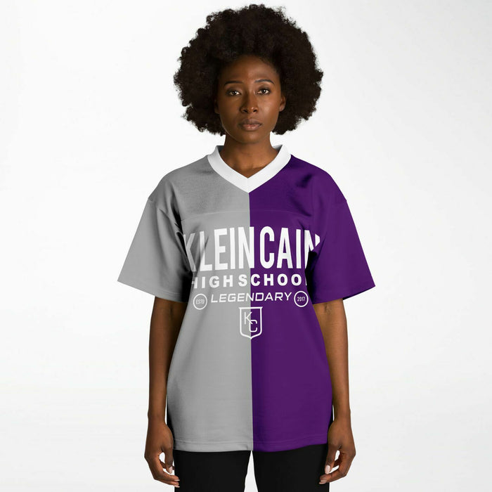 Black woman wearing Klein Cain Hurricanes football Jersey