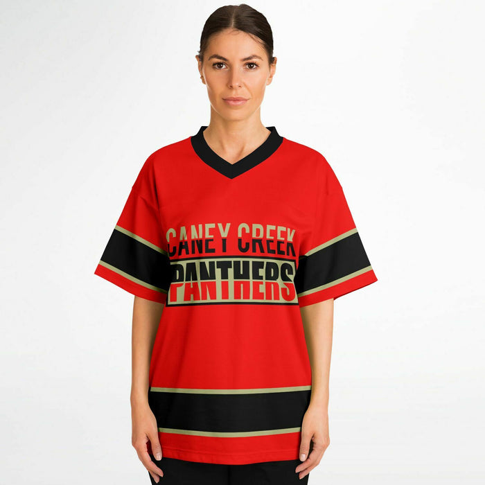 Women wearing Caney Creek Panthers football jersey 13