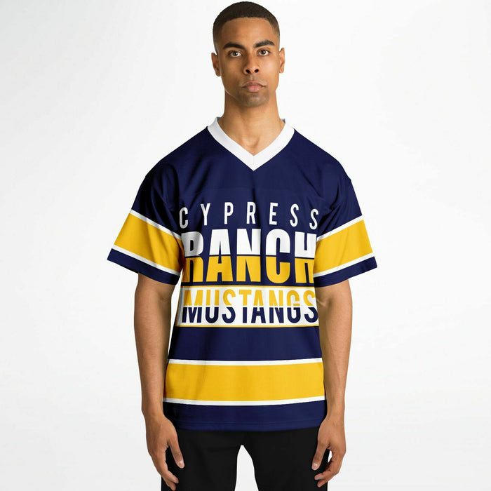 Black man wearing Cypress Ranch Mustangs football Jersey