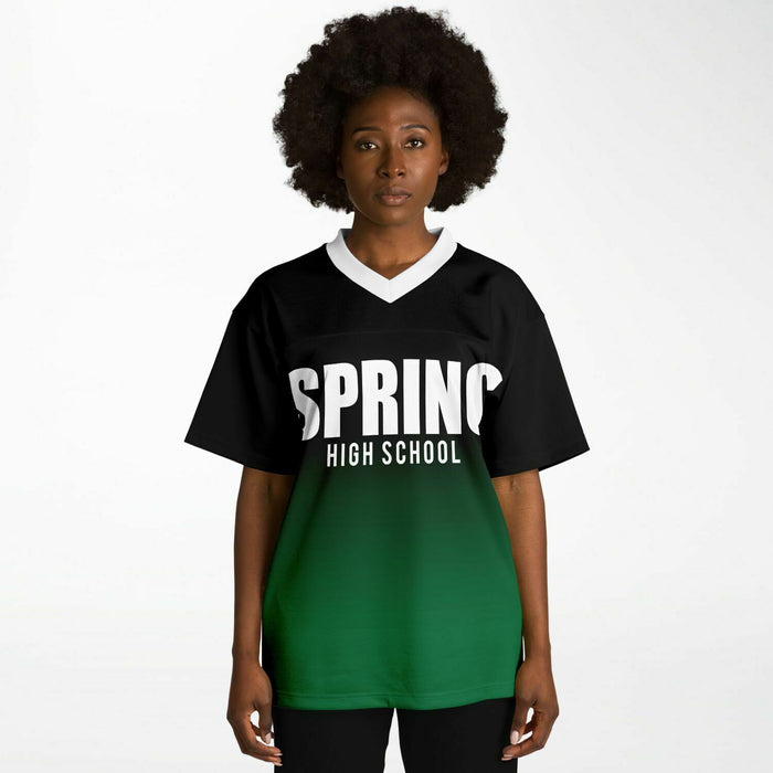 Black woman wearing Spring Lions High School football Jersey