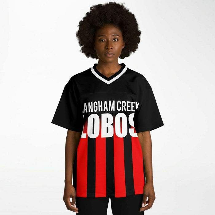 Black woman wearing Langham Creek Lobos football Jersey