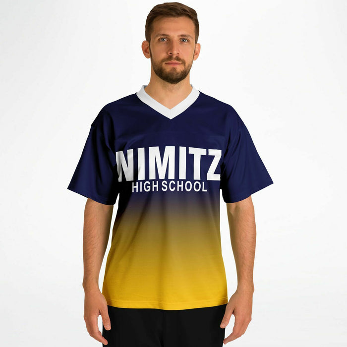 Man wearing Nimitz Cougars High School football jersey