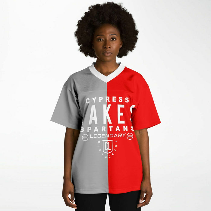 Black woman wearing Cypress Lakes Spartans football Jersey