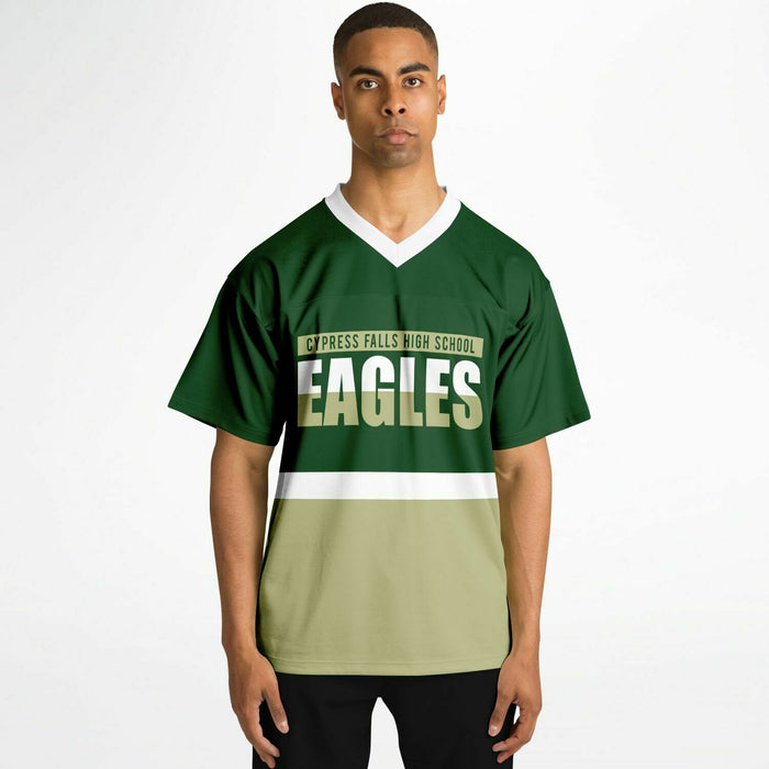 Black man wearing Cypress Falls Eagles football Jersey 10