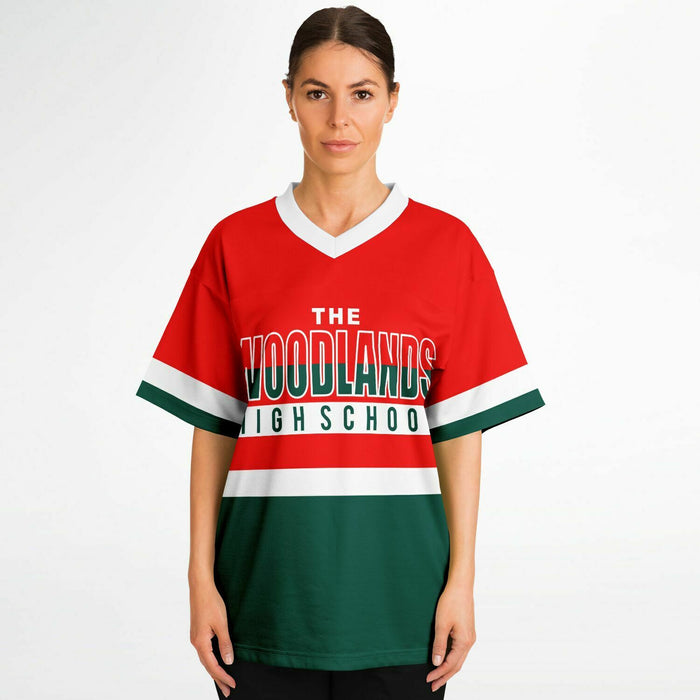 Women wearing The Woodlands Highlanders High School football jersey