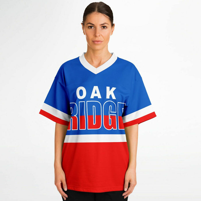 Women wearing Oak Ridge War Eagles High School football jersey