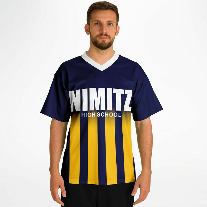 Man wearing Nimitz Cougars High School football jersey