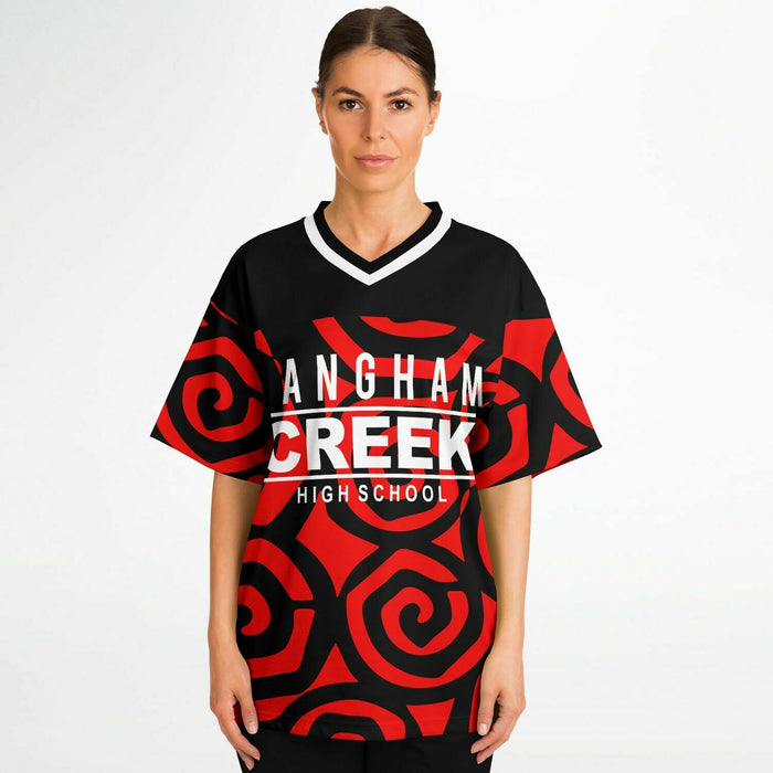 Women wearing Langham Creek Lobos football jersey