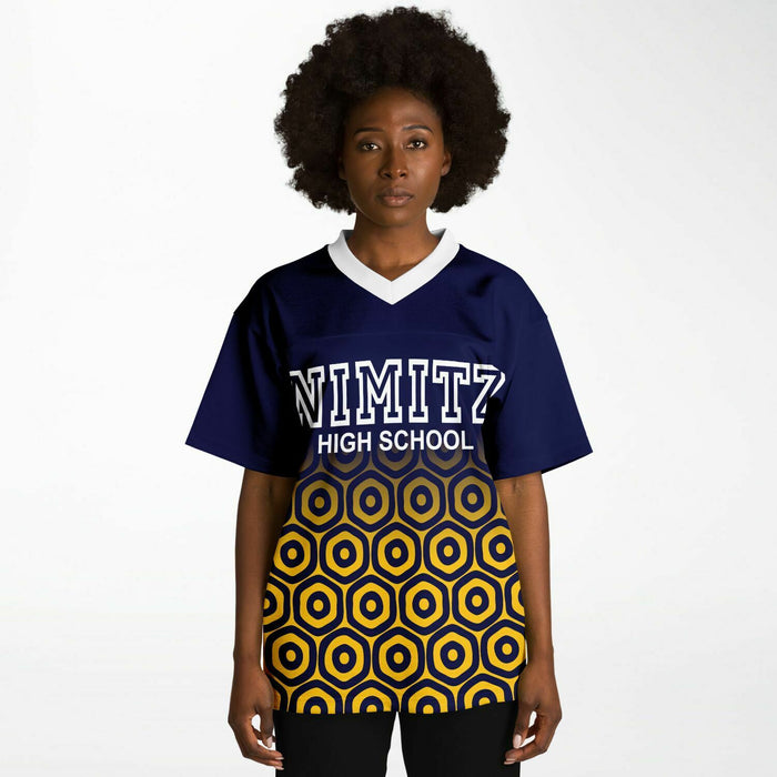 Black woman wearing Nimitz Cougars High School football Jersey