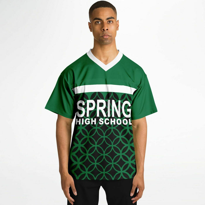 Black man wearing Spring Lions High School football Jersey