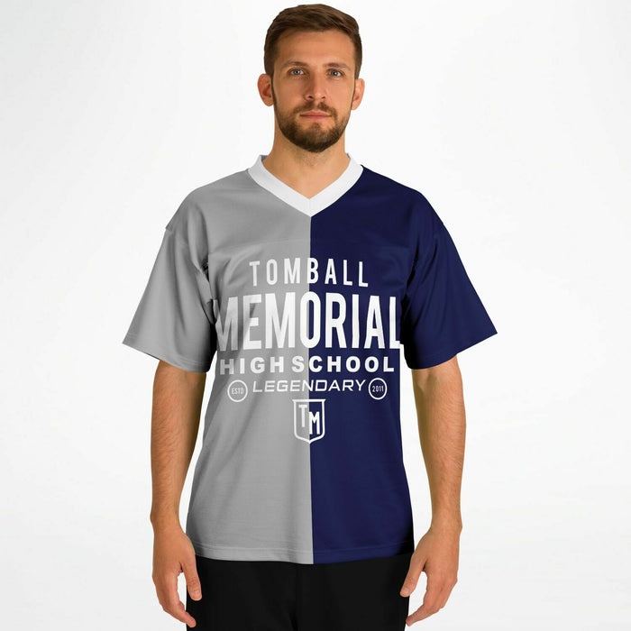 Man wearing Tomball Memorial Wildcats High School football jersey