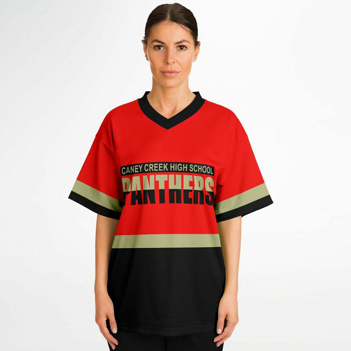 Women wearing Caney Creek Panthers football jersey 10