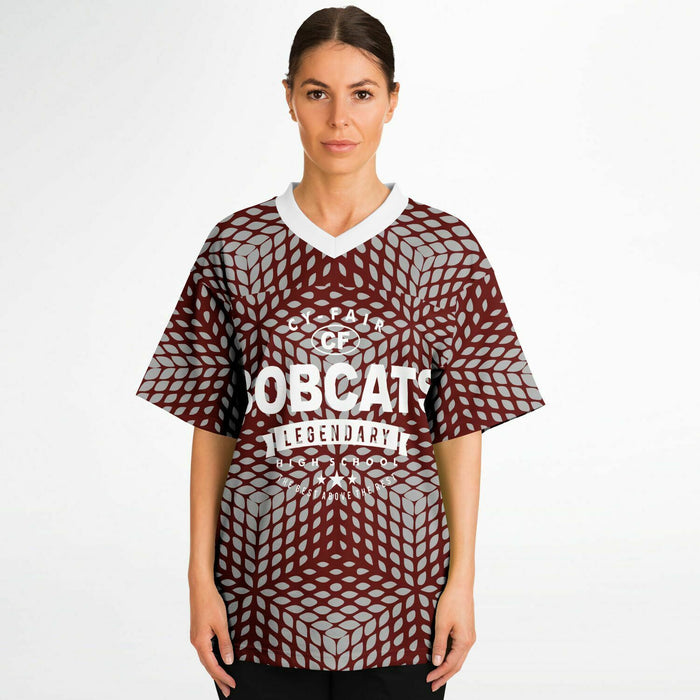 Women wearing Cy-Fair Bobcats football jersey