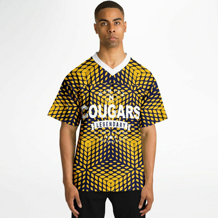 Black man wearing Nimitz Cougars High School football Jersey