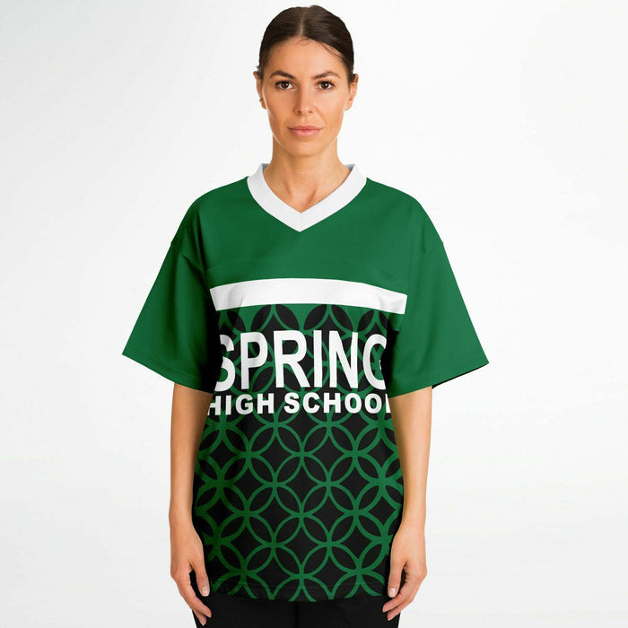 Women wearing Spring Lions High School football jersey